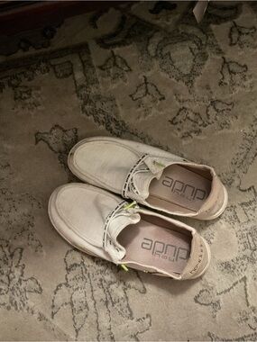 Hey Dude woman’s Off-White/Cream Wally Slip-On Shoes with Neon Accents